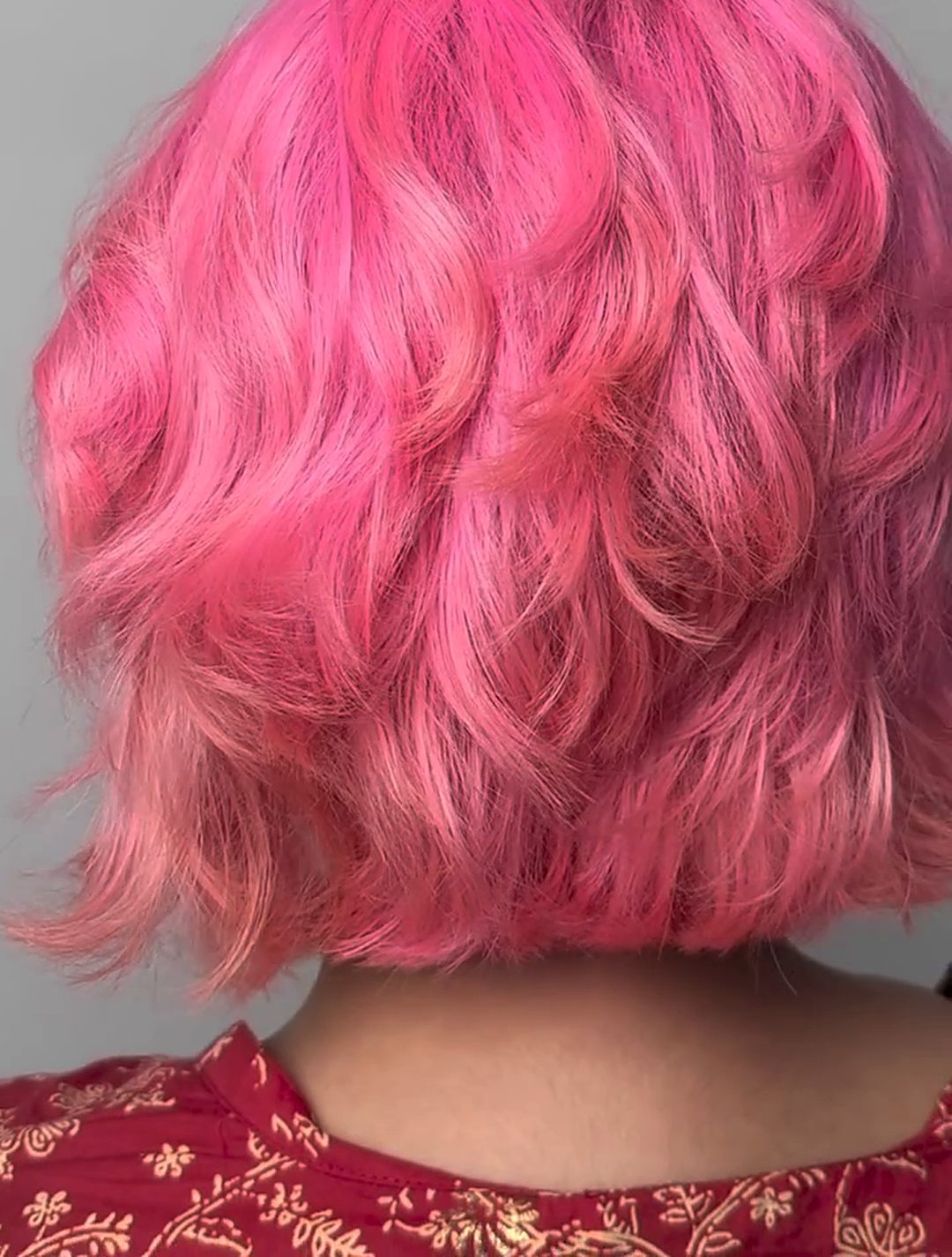 Bold pink waves, styled at Vibes Hair and Beauty